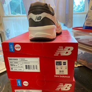 New Balance Men’s size 10 1/2 4E wide! New, still in box.